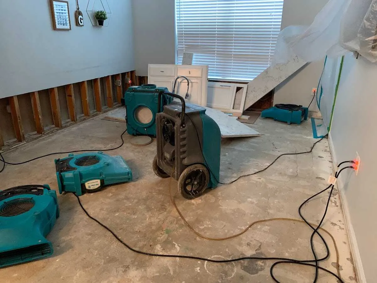 Dehumidifier in flood-cut room for Water Damage Restoration in Florida Gulf Coast University